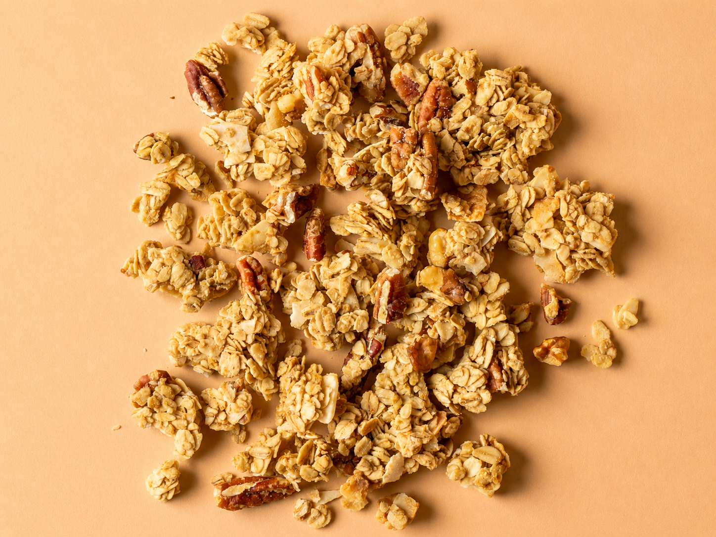 CRUNO coconut walnut granola clusters close up — toasted organic oats and coconut